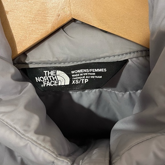 The North Face women’s XS grey puffer vest. Great condition. - Picture 3 of 3